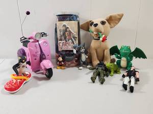 lot 174 image: Mixed Toy Collection with Action Figures and Plush Dog