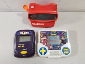 lot 175 image: Retro Handheld Electronic Game and View-Master Set