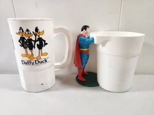 lot 177 image: Daffy Duck Mug and Superman Cup
