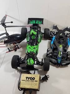 lot 182 image: RC Remote Control Car and Helicopter Collection with Tyco Power Supply