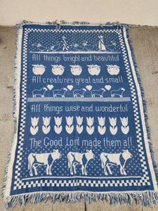 lot 217 image: Blue and White Religious Woven Throw Blanket with Farm Animals
