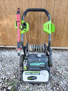 lot 104 image: Greenworks 2000 PSI Electric Pressure Washer - Works - Leaks At Attachment May Need Washer