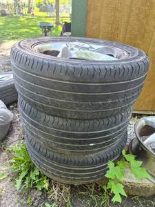 lot 111 image: Pontiac Alloy Wheels and Tires Set