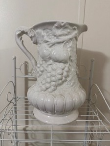 lot 20 image: Large White Relief-Molded Ceramic Pitcher Vase