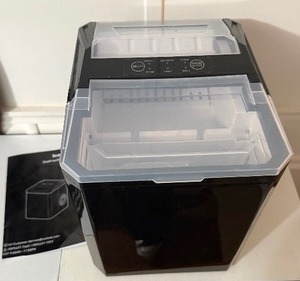 lot 80 image: Countertop Ice Maker with book. Untested
