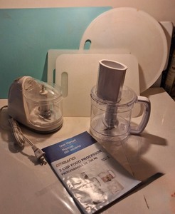 lot 93 image: Compact 3-Cup Food Processor Bundle with Cutting Boards & Manual