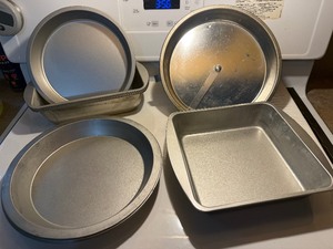 lot 117 image: Large Bakeware Lot  Pie Pans, Loaf Pans & Vintage Easy Release Cake Pans