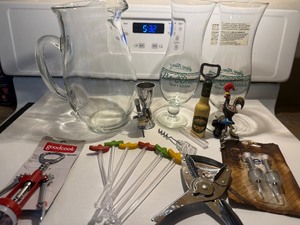 lot 123 image: Barware & Entertaining Lot  Glass Pitcher, Pat OBriens Glasses, Jiggers & Bottle Openers