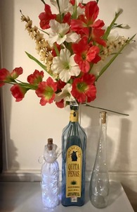 lot 154 image: Vintage Blue Artisan Glass Vase with Red and White Silk Floral Arrangement