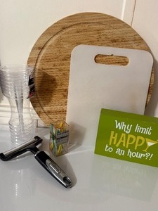 lot 166 image: Essential Kitchen Prep & Decor Bundle - Cutting Boards, Peeler & Sign