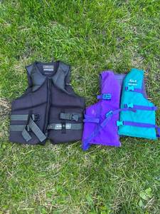 lot 129 image: Life Jacket Collection - Adult Water Safety Vests