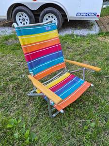 lot 131 image: Rainbow Striped Folding Beach Chair with Wooden Arms