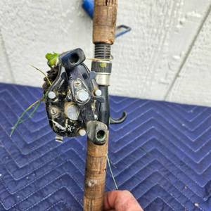 lot 187 image: Saltwater Fishing Rod with Reel - Lime Retriever