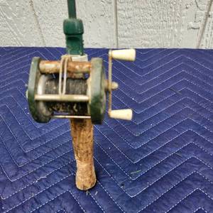 lot 188 image: Green Fishing Rod with Baitcasting Reel and Cork Handle