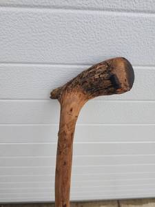 lot 205 image: Handcrafted Wooden Walking Stick with Carved Details