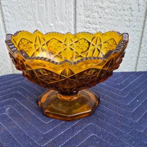 lot 369 image: Amber Pressed Glass Footed Compote Bowl with Star Pattern