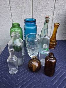 lot 378 image: Colored Glass Bottle Collection Mixed Sizes