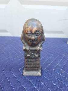 lot 411 image: Heavy Metal Humpty Dumpty Coin Bank