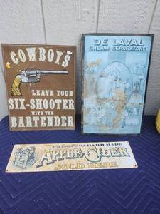 lot 451 image: Metal Tin Advertising Signs Collection - Cowboys, De Laval Cream Separators, Apple Cider