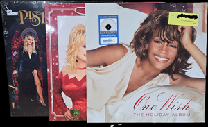 lot 41559 image: Holiday Music Vinyl Record Collection - Dolly Parton, Pistol Annies, and Whitney Houston