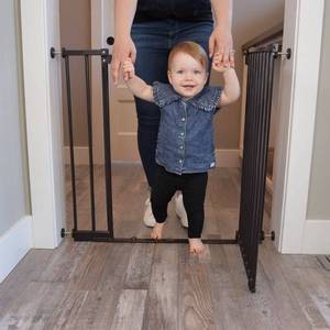 lot 37462 image: Toddleroo by North States StepSafe Auto Close Baby Gate 38 - Black - Retail $60
