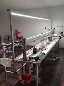Professional Long Arm Quilting Machine with LED Lighting and Stand and Accessories Has a stitch regulator and electric lift. Located in Basement