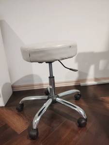 lot 1009 image: Adjustable Height Rolling Swivel Stool with Chrome Base Located in Basement