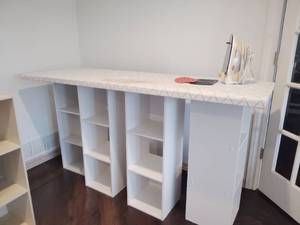 lot 1022 image: White Craft Ironing Table with Storage Cubbies and Iron 38x24x72 in Located in Basement (Unit Will Need Taken Apart Phillips head Screwdriver is Needed)