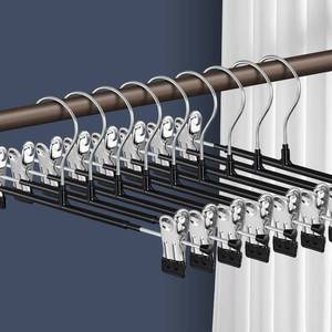 lot 4663 image: HWAJAN Pants Hangers with Clips for Women  Adjustable Heavy Duty Space Saving Skirt Hangers Non-Slip Trousers, Jeans Clothes ,Shorts Black,12Inch