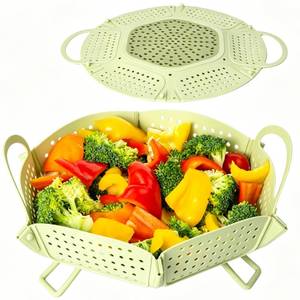 lot 2062 image: Large Collapsible Silicone Steamer Basket, Folding Silicone Vegetable Steamer Basket With Handles, BPA Free, Expandable for Pot, Non Slip Feet, Compact Storage, Dishwasher Safe