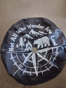 lot 2075 image: Polar bear theme tire cover approximately 33 in round