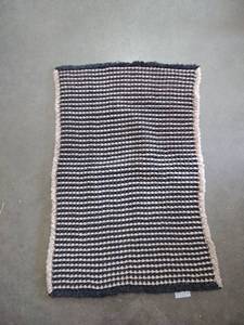 lot 2080 image: Fuzzy yarn welcome Matt Black and brown approximately 30 in by 21 in