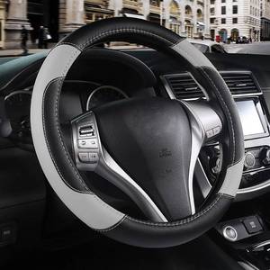 lot 4036 image: Leather Car Steering Wheel Cover, Non-Slip Car Wheel Cover Protector Breathable Microfiber Leather Universal Fit for Most Cars(Grey)