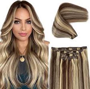 lot 14003 image: Human Hair Extensions Mixed Brown Blonde Approx. 18in