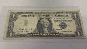 lot 12 image: One dollar silver certificate Blue Seal Series 1957 A - Serial Number K51952911