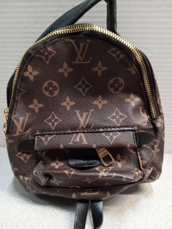 lot 4352 image: Louis Vuitton Monogram Canvas Mini Backpack (Not authenticated)