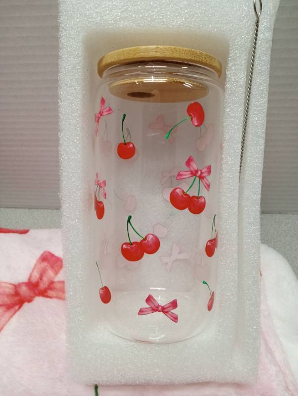 lot 4816 image: Cherry Print Glass Jar and Fabric Bundle Set