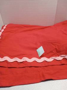 lot 5807 image: Red Tablecloth with Pink Ric Rac Trim 60 x 84