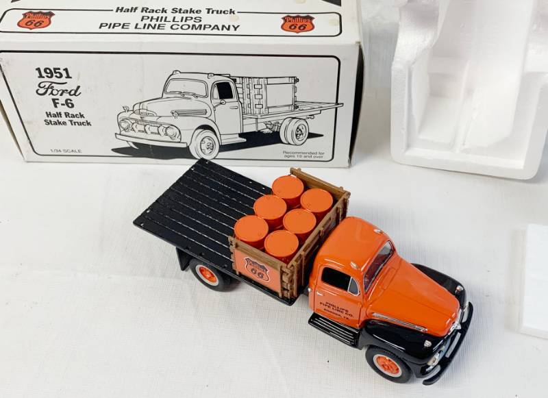 lot 8021 image: Phillips 66 - Phillips Pipe Line Co. Borger, TX - 1951 Ford F-6 Half Rack Stake Truck Bank - 134 Scale