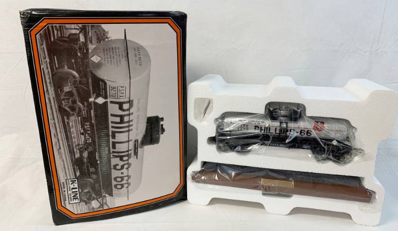 lot 8051 image: Phillips 66 - Phillips Petroleum Company - Bartlesville, OK - Die-Cast Metal - Riveted Tank Car Bank - Limited Edition 1 of 1200 - with Track Display