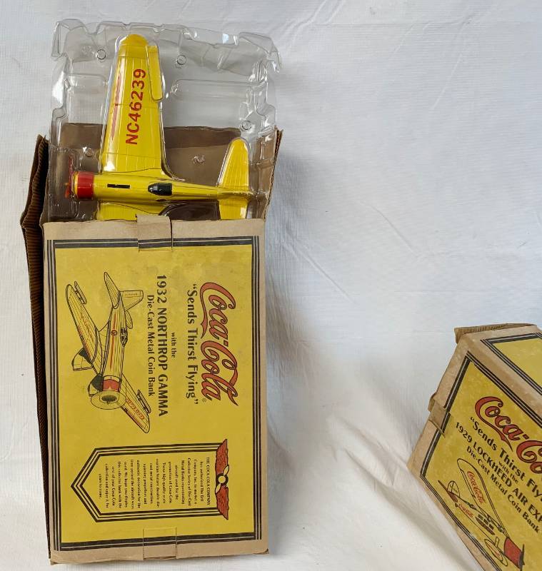 lot 8055 image: ERTL Coca-Cola - Sends Thirst Flying - 1929 Lockheed Air Express Die-Cast Metal Coin Bank - Coke
