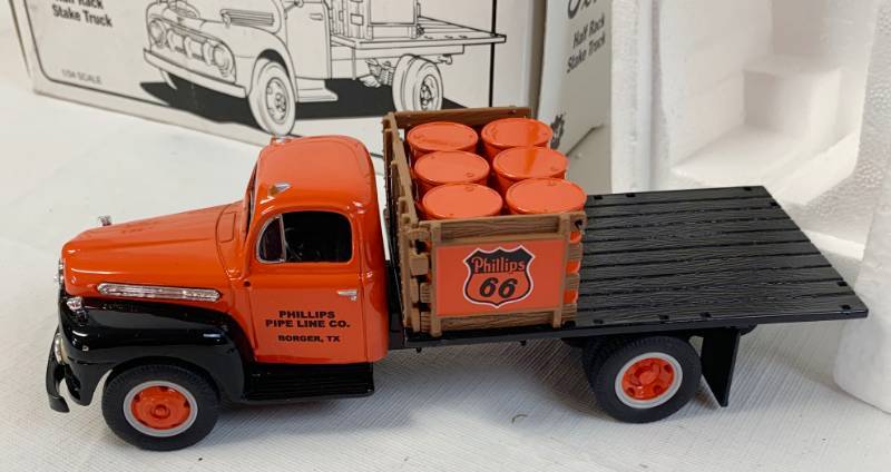lot 8023 image: Phillips 66 - Phillips Pipe Line Co. Borger, TX - 1951 Ford F-6 Half Rack Stake Truck Bank - 134 Scale
