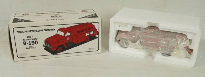 lot 6068 image: FIRST GEAR - Truck Coin Bank - Phillips 66 Petroleum Company - 134 scale 1957 Ford International R-190 w fuel tanker w KEY - NEW IN BOX 19-1706