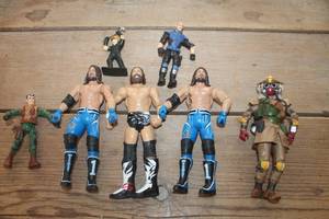 lot 1233 image: Vtg. Wrestling Figures and More