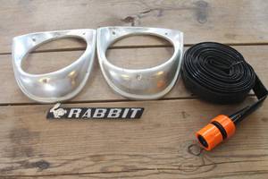 lot 1234 image: Vtg. Head Light Covers, Soaker Hose & More