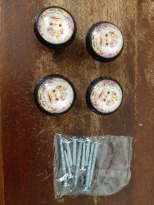 lot 16743 image: 4 Pack Bunny with Happy Easter Ribbon Cabinet Knobs Round Drawer Pulls Black Dresser Knob Cupboard Door Handles Hardware for Kitchen Bathroom Cabinets - Retail $15