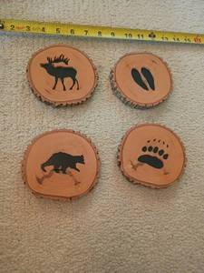 lot 904 image: Handcrafted Wood Slice Wall Decor with Wildlife Animal Cut Outs