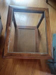 lot 913 image: Wooden Side Table with Glass Top and Bottom Shelf.  21 x 21 x 26.  Top needs repaired