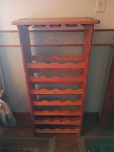 lot 927 image: Wooden Wine Rack. Holds 28 bottles and glasses too.  45 x 22 x 10