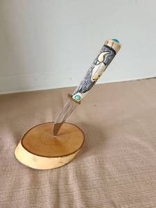 lot 1008 image: Custom made knife by artisan Ted Miller, featuring a carved stag antler handle with turquoise inlays, signed and numbered